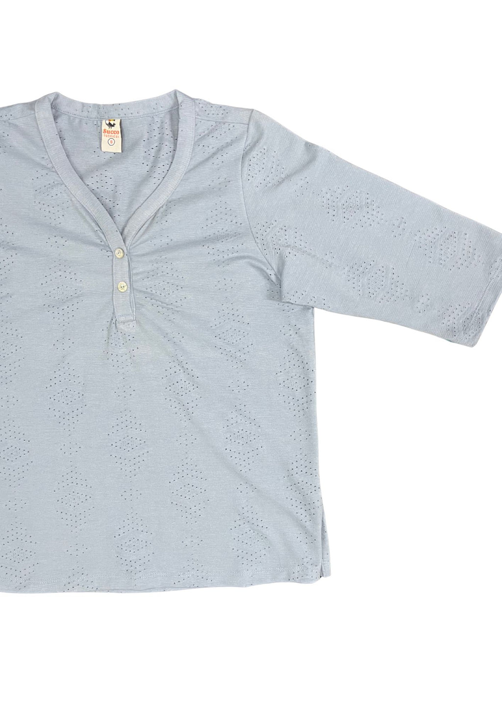 23790B blusón silueta amplia, tela texturizada.