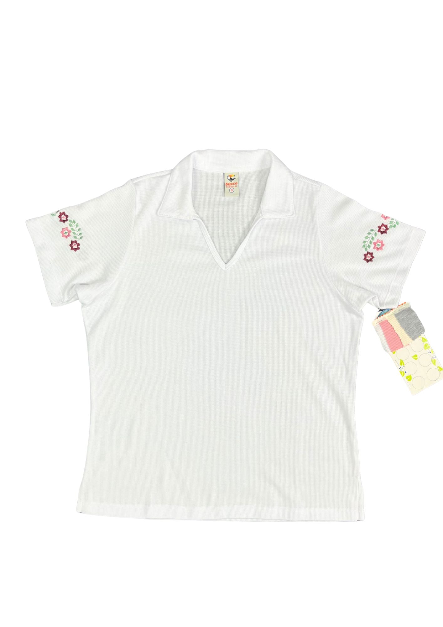 23744B blusón silueta amplia, bordado floral.